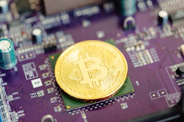Bitcoin mining farm with rows of machines steadily processing transactions